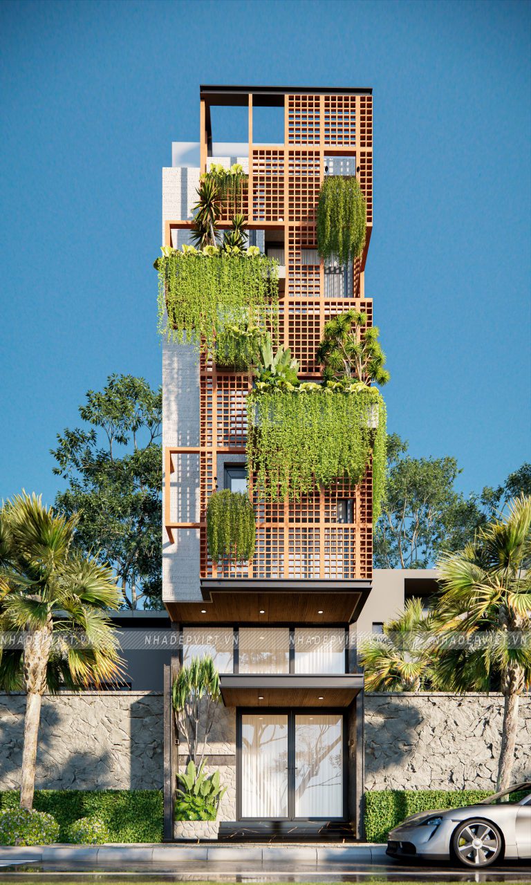 Ngôi nhà phố 4 tầng khoác lên chiếc áo độc đáo từ gạch hoa gió và cây xanh